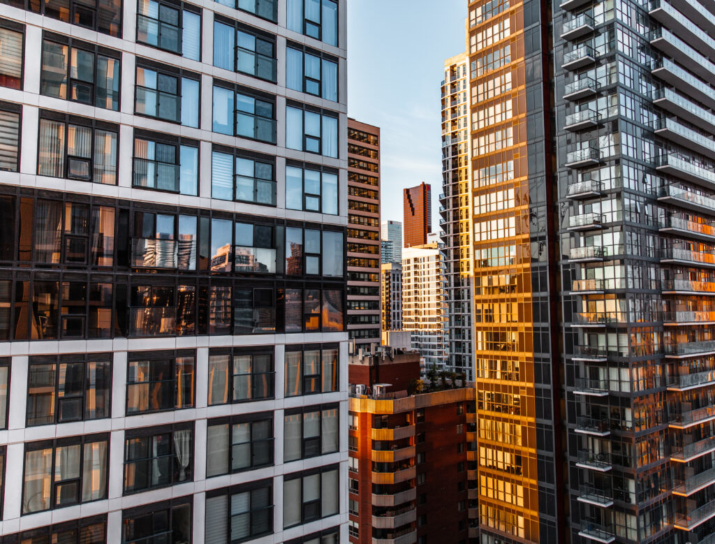 The modern tall glass buildings in downtown
